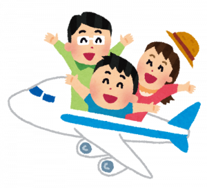 家族で飛行機に乗って旅行